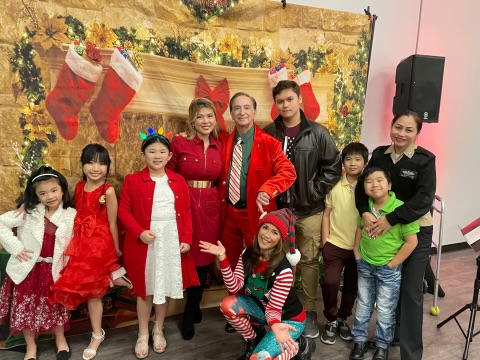 Families and children at the APCA Christmas benefit
